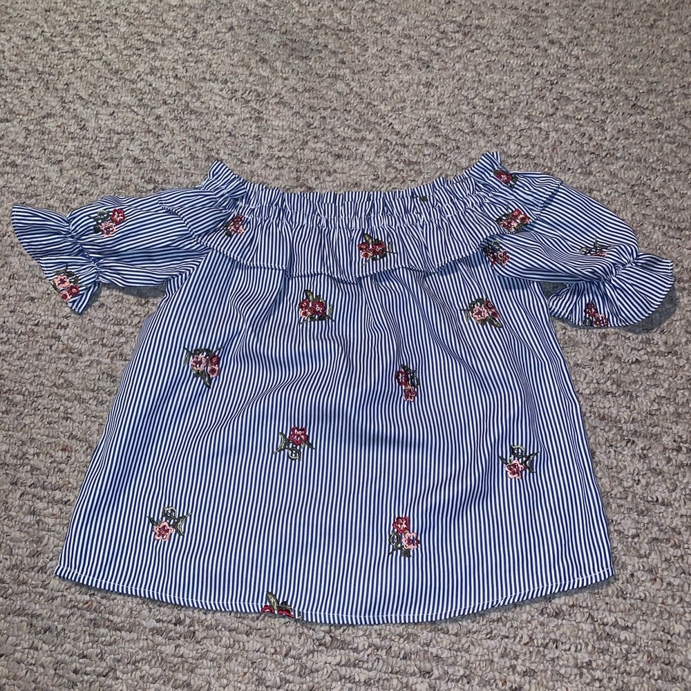 Blue and white off the shoulder shirt with flowers